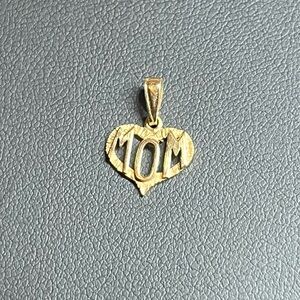 10k gold “Mom” pendant charm. Necklace or bracelet.